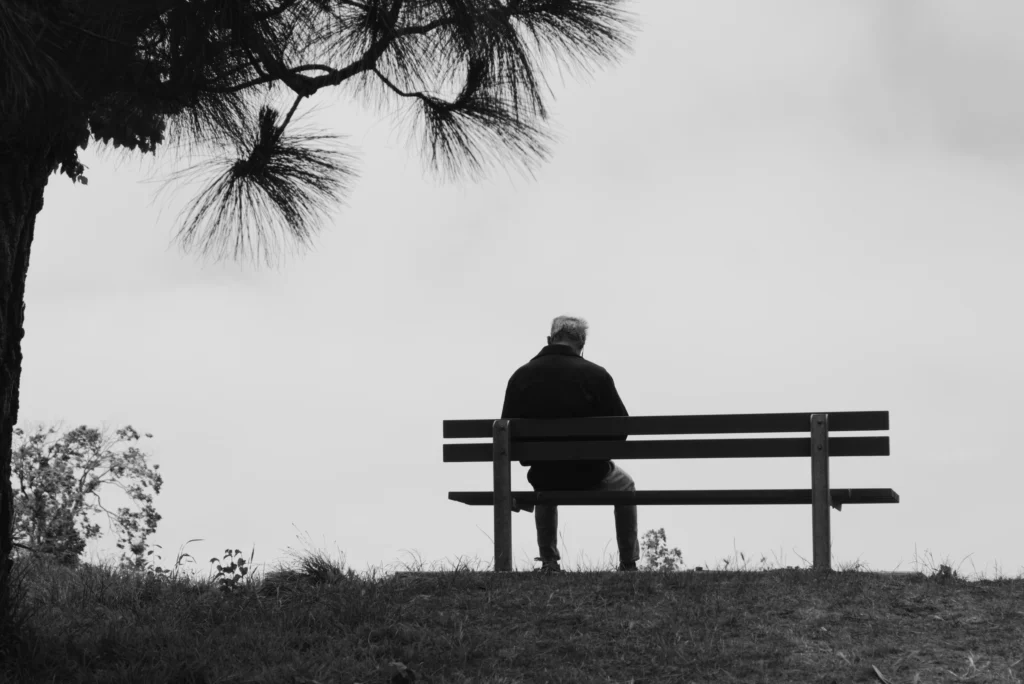 Older adult receiving therapy to manage loneliness